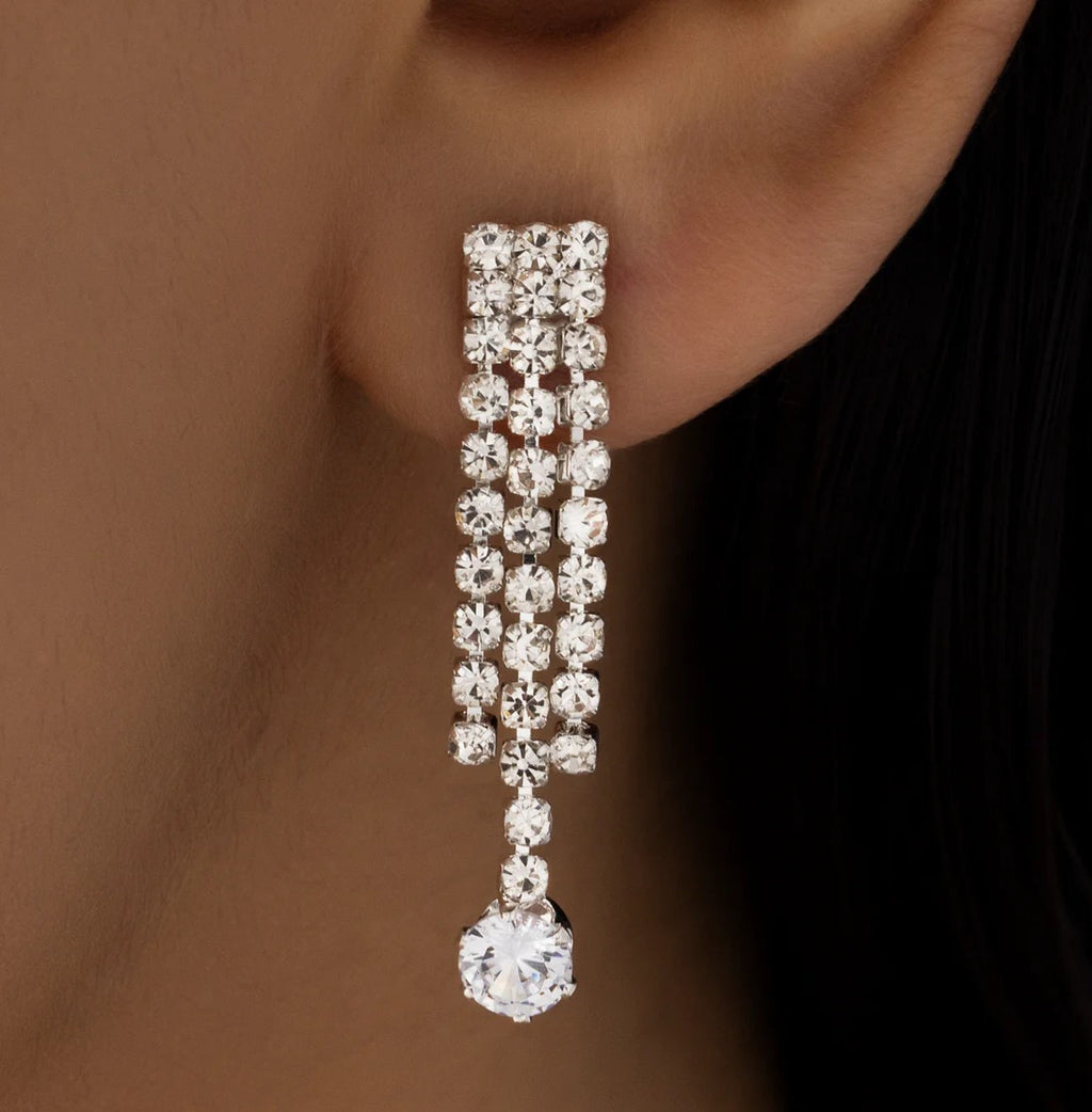 Close-up of rhinestone dangle earrings from the triple-layer necklace set.