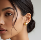 Round ball stud earrings with anti-tarnish finish, close-up.