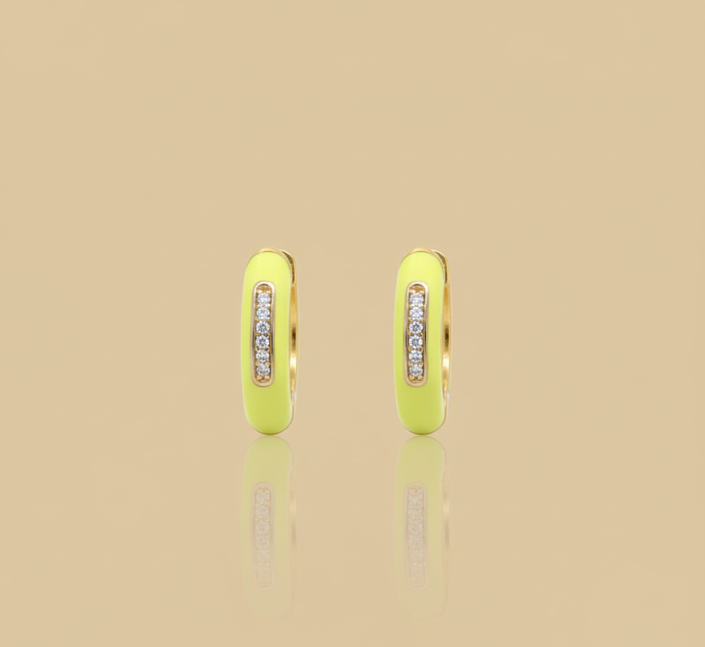 Pair of neon yellow hoop earrings with embedded  on a beige backgroundZ